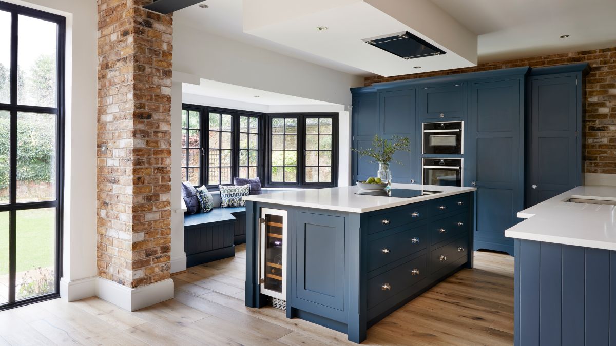 This kitchen fuses classical cabinetry with industrial design – find out how to copy the look